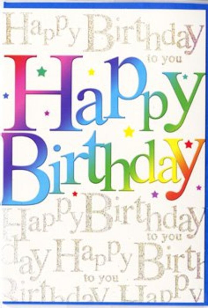 A colourful, contemporary birthday card stands on display, its front designed to capture the same cheerful energy you might feel arriving at a birthday gathering in Kidbrooke. Across the centre, the words Happy Birthday are written in generous, bubbly letters, slightly curved as though strung like a banner across the card. Each letter is filled with a softly blended gradient that drifts from rich berry reds into glowing oranges, mellow yellows, vivid greens and calm blues, much like the varied tones of a mixed birthday bouquet arranged for delivery around Kidbrooke Village or down towards Shooters Hill Road. There are no harsh boundaries between the shades; instead, the colours melt into one another with an airbrushed effect, giving the text a smooth, velvety appearance that feels both playful and polished. Behind this prominent greeting, the entire background is covered with rows of delicate cursive script, repeating Happy Birthday to you in a fine, gold-coloured ink. The handwriting-style font loops and curls gracefully, forming an intricate pattern that resembles lines of a song quietly humming behind the main message. The metallic ink reflects light softly, adding a gentle shimmer that shifts with movement, similar to the way light filters through tree branches near the playing fields and pathways of Kidbrooke. Subtle glimmers appear between some of the letters, giving the impression of tiny specks of confetti scattered across the surface. The card stock appears smooth and of good quality, likely with a semi-gloss or satin finish that enhances the vibrancy of the colours without making them harsh. Overall, the card's design feels warm, joyful and thoughtfully composed, perfect for accompanying a fresh bouquet and making a loved one's birthday in Kidbrooke feel a little more magical.