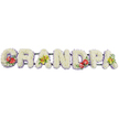 A horizontal floral arrangement in this image spells out the word "GRANDPA" in large, three-dimensional letters, designed as a personal and dignified funeral tribute. Each letter is completely covered in a carpet of white chrysanthemums, their neat, evenly spaced blooms creating a thick, pillow-like texture that feels soothing and gentle, as though inviting a quiet moment of reflection. Fine details in the petals catch the light, adding subtle movement across the surface of the design. At the base of each letter, a delicate trim of pale lavender ribbon traces a soft line of colour, framing the white flowers with a cool, understated contrast that helps define the lettering. The letters are linked together on dark green bars that provide hidden support, allowing the tribute to be placed in one sweeping line at the front of a service or near the coffin. To add depth and emotional resonance, four of the letters carry colourful spray decorations: the 'G' and the 'D' display bold clusters of red anthuriums, their smooth, heart-shaped spathes and prominent spadices gleaming against glossy green foliage and tiny touches of purple filler blooms. The first and last 'A' are accented with sprays of yellow-green orchids, whose elegant petals and buds rest in fresh leaves, bringing a hint of softness and continuity. The plain white background keeps the focus entirely on the flowers, making it easy to imagine this tribute at a farewell gathering in Kidbrooke, where family and friends might draw comfort from a grandad's name written so lovingly in blooms that speak of respect, gratitude, and enduring love.